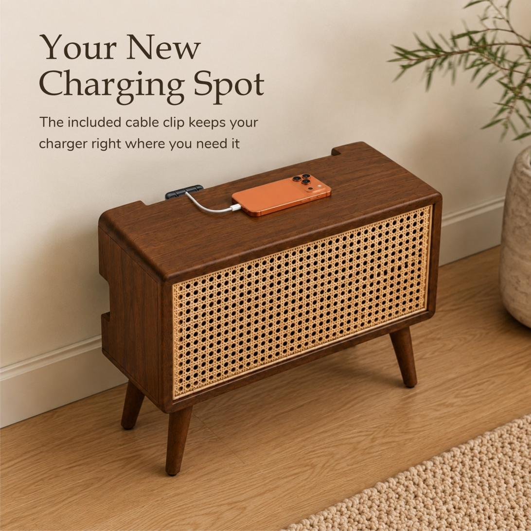 Phone charging on top of the KAKURE cabinet, cable held at hand by the included flexible clip